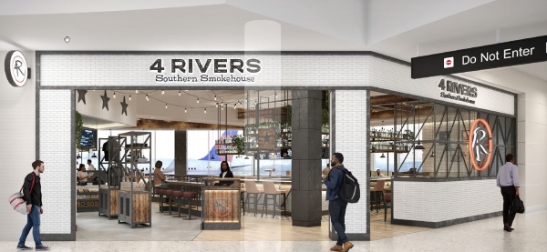 A modern airport restaurant with slick black lines, wooden furniture, and a sign reading 4 Rivers Southern Smokehouse.