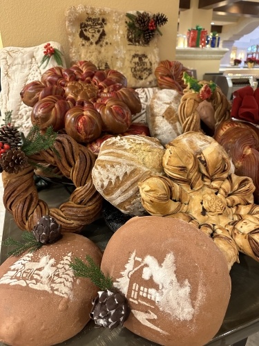 A display of beautifully decorated breads at the Christmas buffet. 