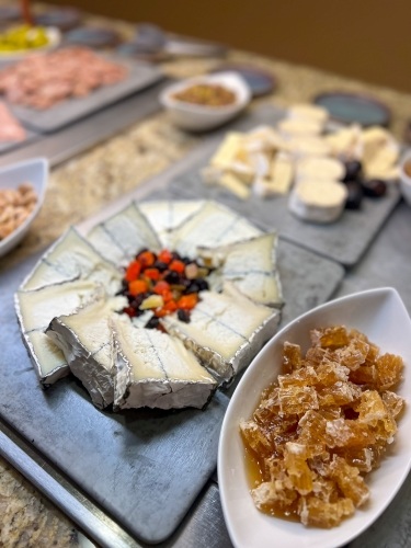 An array of cheeses and honeycomb from the Rosen Shingle Creek Christmas Day buffet.