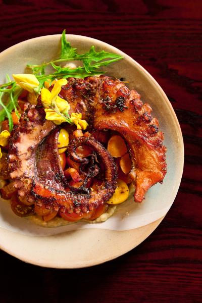 Magical Dining 2026 at A Land Remembered in Orlando 2 A dish with charred octopus from Magical Dining at A Land Remembered.