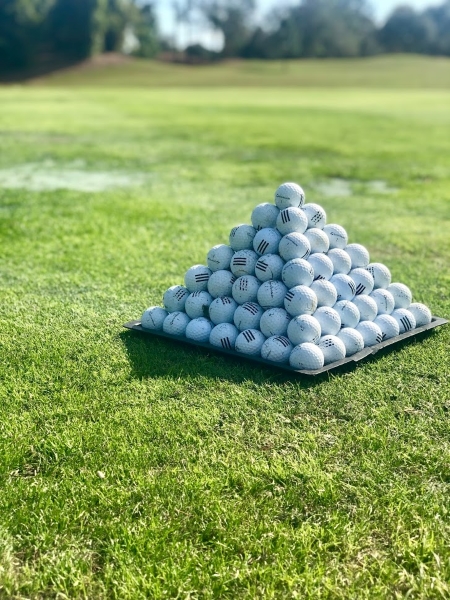 A Golfer's Guide to Shingle Creek Golf Club: Course Highlights and Tips 4 A pyramid of range balls at Shingle Creek Golf Academy located next to Rosen Shingle Creek in Orlando.