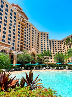 A sparkling blue swimming pool at Rosen Shingle Creek resort in Orlando.