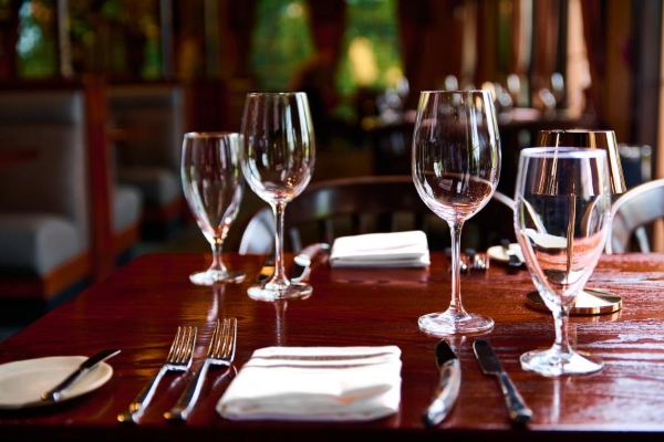 Magical Dining 2026 at A Land Remembered in Orlando 5 A table setting with fine glassware and silverware at A Land Remembered.