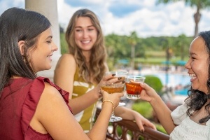 Girls at Cala Bella enjoying cocktails overlooking the beautiful Shingle Creek golf course. 