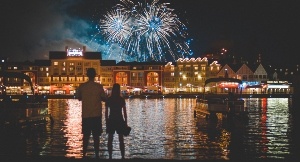 A couple enjoying the romantic Disney fireworks.
