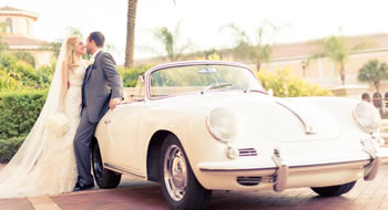 Wedding Couple in front of Car